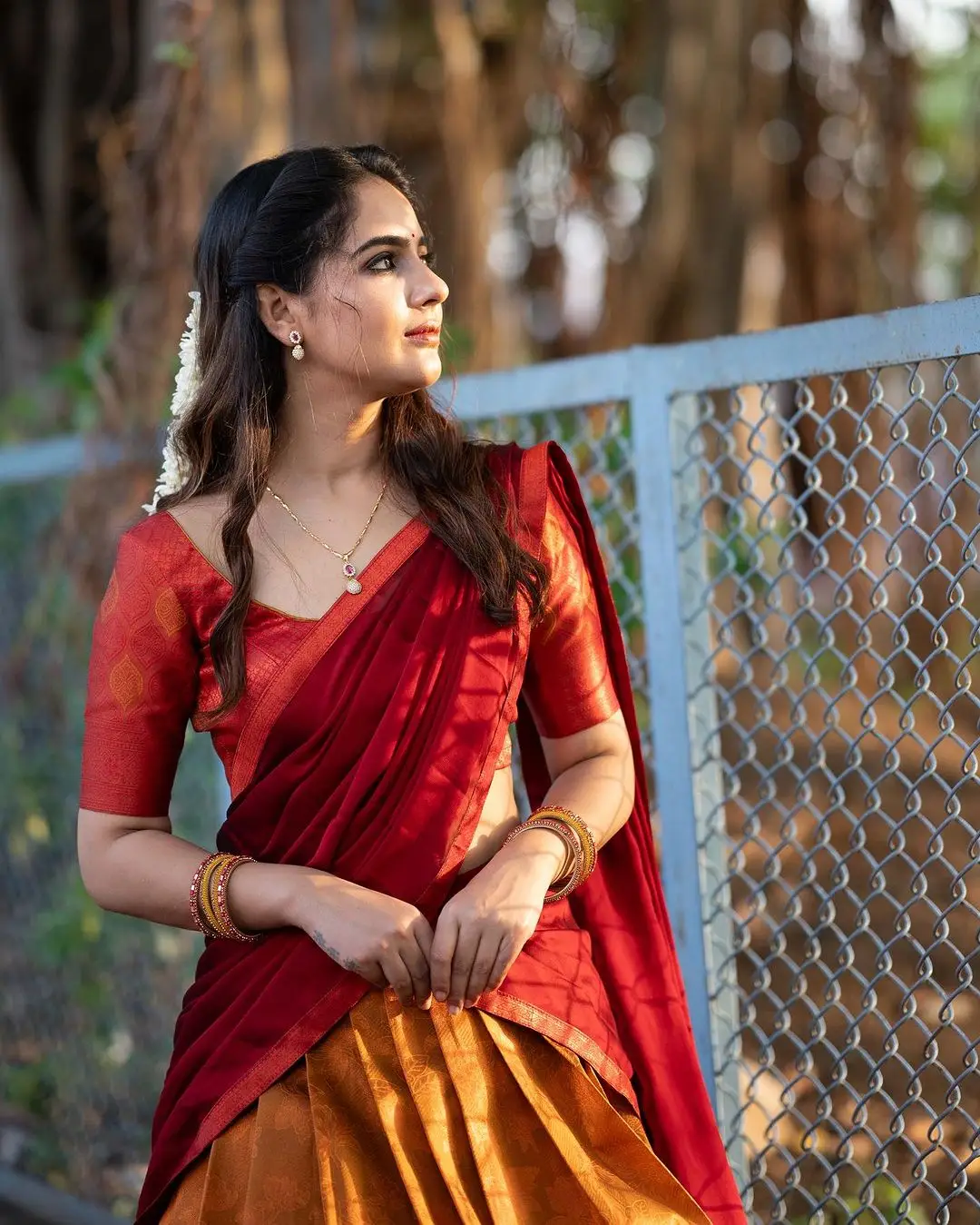 Malvi Malhotra Stills in Orange Lehenga Red Choli Maroon Voni